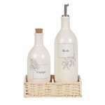 Vinaigrier et huilier en céramique blanche motifs noirs au trait plateau tressé en saule Vinaigrier et huilier en céramique blanche motifs noirs au trait plateau tressé en saule