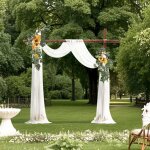 Arche de mariage jaune artificielle avec 2 fleurs et 1 tentures Arche de mariage jaune artificielle avec 2 fleurs et 1 tentures