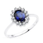 Bague en or blanc 18 carats avec saphir de 098 ct et diamants taille brillant de 035 ct.