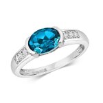 Bague solitaire femme or blanc 375 / 1000 et diamant brillant 0. 06 carat avec topaze bleue de londres ...