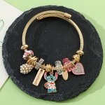 Bracelet rigide doré avec charms ? pendentif stitch émaillé ? bijou fantaisie disney femme Bracelet rigide doré avec charms ? pendentif stitch émaillé ? bijou fantaisie disney femme