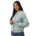 Cardigan en maille c�tel�e. fermeture par 5 boutons marbr�s. finitions bord c�te sur le col le bas et ...