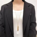 Collier long avec pendentifs bohme imitation de plumes or pour femme ? sautoir longue chane de pull ...