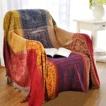 Couverture jet�e en chenille jacquard � pompons pour canap� fauteuil ou table - motif tribal color� (218 ...