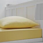 Drap housse - 140x190 cm - 100% coton - tissage serré 57 fils / cm² - bonnet 30 cm extensible jaune Drap housse - 140x190 cm - 100% coton - tissage serré 57 fils / cm² - bonnet 30 cm extensible jaune