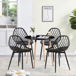 Ensemble salle  manger lgant - table ronde noire et 4 chaises noires