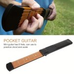 Mini outil dentraînement portable pour guitare à 6 cordes entraîneur daccords pour guitare et basse matériaux ... Mini outil dentraînement portable pour guitare à 6 cordes entraîneur daccords pour guitare et basse matériaux ...