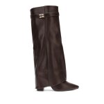 La modeuse - bottes cuissardes - bottes hautes en simili  talon et fourreau. dotes dune bride  dtail ...