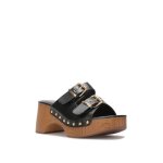 Mules sabots dot�s de clous dor�s. mod�le avec deux brides r�glables et deux boucles dor�es. semelle ...