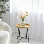 Petite table basse ronde en rotin - sophistication naturelle avec pieds en mtal noir