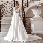 Robe de marie longue en satin et dentelle ecelen col en v manches mi - longues - blanc