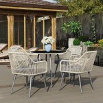 Salon de jardin ensemble 4 places en r�sine tress�e avec coussins et table ronde en verre marron pour ...
