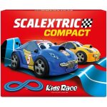 Scalextric - circuit compact - piste de course compl�te - 2 voitures et 2 t�l�commandes 143 (kids race) ...