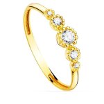 Bague en or 18 carats pour femme avec une lunette centrale de 4 mm et un zircon cubique.