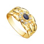 Bague en or 18 carats avec un saphir naturel de 4 mm au centre associ� � des oxydes de zirconium.