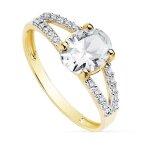 Bague solitaire bicolore en or 18 carats avec zircone ovale de 8 x 6 mm. deux anneaux.