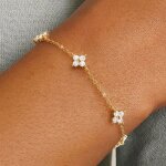 Bracelet femme - bracelet trefle - bracelet amiti� - r�glable - 21cm - zircon cubique papillon fleur ...