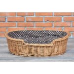 Corbeille panier ovale pour chien avec coussin.