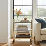 Desserte pliante bauhaus avec roulettes structure dor�e 3 niveaux 3 positions don hierro. fr�nefr�ne