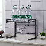 Etagère de cuisine en métal noir avec 3 crochets - support pour micro - ondes et four de rangement Etagère de cuisine en métal noir avec 3 crochets - support pour micro - ondes et four de rangement