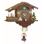 Horloge - maison suisse - pendulette de la fort noire - danseurs tournants - noyer