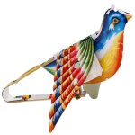 Jeu jouet ancien oiseau en tole a soufflet qui chante oiseau qui bat des ailes