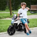 Moto �lectrique pour enfants honda 3 km / h musique et lumi�res 3 - 6 ans jusqu� 30 kg blanche