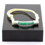 Pierres et min�raux. bracelet emeraude brut. couleur beige.