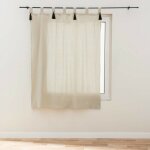 Rideau tamisant cyrine 140 x 180 cm polycoton beige naturel � passants - pompons noirs