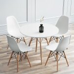 Table à manger scandinave - ronde blanche - pieds en bois hêtre - 2 - 4 personnes Table à manger scandinave - ronde blanche - pieds en bois hêtre - 2 - 4 personnes