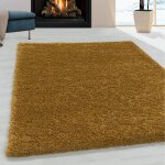 Tapis de salon shaggy design poil souple monochrome or (160x230 cm) Tapis de salon shaggy design poil souple monochrome or (160x230 cm)