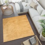 Tapiso tapis salon shaggy carré poil long essence jaune uni polypropylène intérieur 120x120 Tapiso tapis salon shaggy carré poil long essence jaune uni polypropylène intérieur 120x120