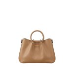 Ted lapidus sac port� main naturel