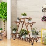 Porte plante - unho - tagre en bois  roulette - dcoratif - pour maison et jardin - universel