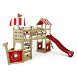 Aire de jeux en bois wickey stormflyer avec balanoire toboggan et bac  sable - rouge