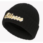 Bonnet - ellesse - noir et jaune - tricot doux - taille unique - accessoire de mode Bonnet - ellesse - noir et jaune - tricot doux - taille unique - accessoire de mode