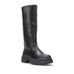 Bottes en simili dotes dune semelle crante paisse. modle avec surpiqures et lastique sur la tige. ...