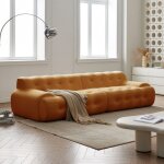 Canapé en tissu livré roulé couleur orange Canapé en tissu livré roulé couleur orange