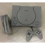 Console playstation 1 + 3 jeux
