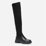 Cuissardes bi - mati�res en simili et su�dine. mod�le � bout rond et fermeture � glissi�re c�t� int�rieur. ...