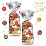 Lindt - 2 sachets de 25 bouchées assorties lindor - chocolat noir lait blanc - 2x312gr Lindt - 2 sachets de 25 bouchées assorties lindor - chocolat noir lait blanc - 2x312gr