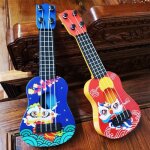 Ukull pour enfants - omabeta - modle lion - 4 cordes - couleur rouge et bleu - mini instrument