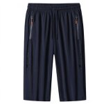 Pantacourt de sport élastique à séchage rapide - homme - bleu - poches zippées - cordon de serrage Pantacourt de sport élastique à séchage rapide - homme - bleu - poches zippées - cordon de serrage