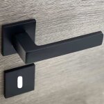 Poignes de porte sur rosace noir mat carr modle nathaly trou de cl l