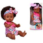 Poup�e nenuco afro style 35 cm - fonction boit et fait pipi - pour enfants � partir de 2 ans