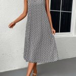 Robe midi chic - sans manches imprimé unique - femme - noir Robe midi chic - sans manches imprimé unique - femme - noir