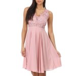 Robe patineuse � dos ouvert et smock� avec bouton. dot�e dune doublure satin�e et de coques de maintien. ...