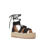 Sandales � brides en su�dine avec cordon torsad� � nouer. dot�es dune semelle plateforme en cordage. ...