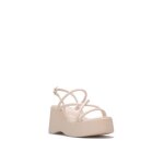 Sandales en simili � plateforme compens�e. dot�es de lani�res crois�es ajustables � la cheville. semelle ...