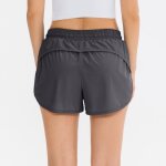 Short de sport femme avec doublure poches taille lastique scher rapide running couleur unie